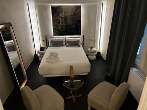 Postel nebo postele na pokoji v ubytování Abalú Design Boutique Hotel Gran Via