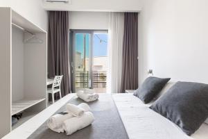 A bed or beds in a room at La Corte dei Pozzi