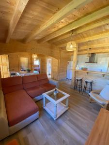 a living room with a couch and a table at Casas Guemon in Zahora