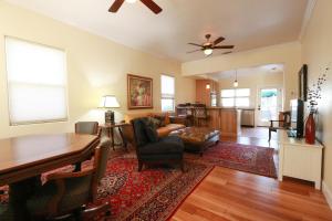 a living room with a couch and a table at Olive with a Twist in Paso Robles