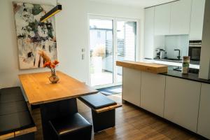 Kuchyň nebo kuchyňský kout v ubytování Apartments Verde