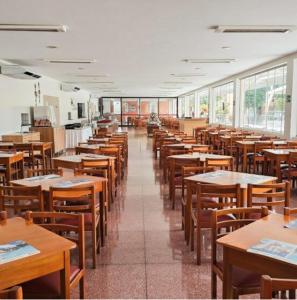 Un restaurant u otro lugar para comer en DiRoma Fiori - Flat