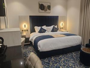 Postel nebo postele na pokoji v ubytování فندق تارا بلس Tara Plus Hotel
