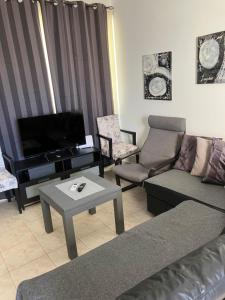 TV a/nebo společenská místnost v ubytování Protaras, Janas apartment