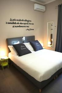 Postel nebo postele na pokoji v ubytování B&B Relais Carmen Pompei