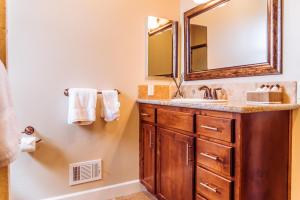 a bathroom with a sink and a mirror at Red Cloud Rendezvous in Paso Robles +43 photos