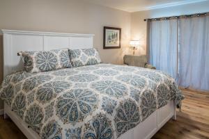 En eller flere senge i et værelse på The Top Shelf