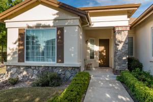 a home with a pathway leading to the front door at Ritz Del Rio in Paso Robles