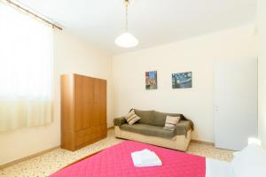 Postel nebo postele na pokoji v ubytování Aloe Apartments