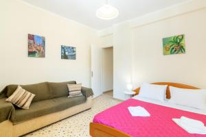 Postel nebo postele na pokoji v ubytování Aloe Apartments