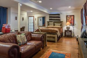 a living room with a couch and a bed at San Antonio Estate in Atascadero