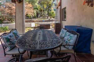 a black table and chairs on a patio at San Antonio Estate in Atascadero
