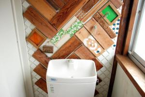Koupelna v ubytování Nikko Guesthouse Sumica