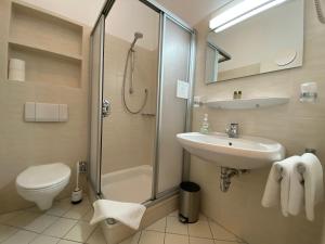 Koupelna v ubytování Adamidis Hotel