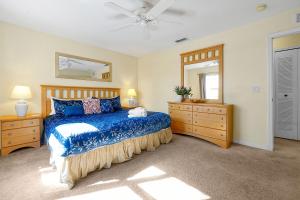 A bed or beds in a room at The Regal Palms Resort With Lazy River and Arcade Games