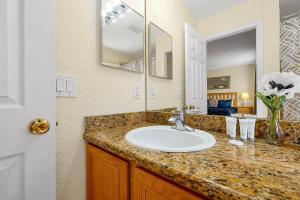A bathroom at The Regal Palms Resort With Lazy River and Arcade Games