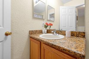 A bathroom at The Regal Palms Resort With Lazy River and Arcade Games