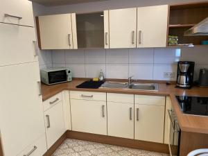 Kuchyň nebo kuchyňský kout v ubytování Ferienwohnung in Michelbach an der Bilz