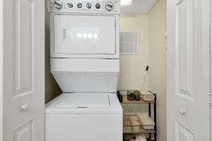 A kitchen or kitchenette at The Regal Palms Resort With Lazy River and Arcade Games