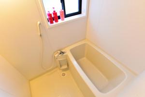 Koupelna v ubytování Nikko Guesthouse Sumica