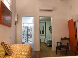 Postel nebo postele na pokoji v ubytování DIMOR'A' ROOMS