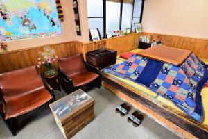 Posezení v ubytování Nikko Guesthouse Sumica