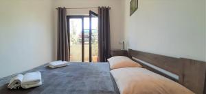 Ένα ή περισσότερα κρεβάτια σε δωμάτιο στο Guest House Helena close to Beach