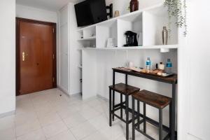 Kuchyňa alebo kuchynka v ubytovaní Casa Alana- Apartamentos en Suite Budha- Las mejores vistas y ubicación !