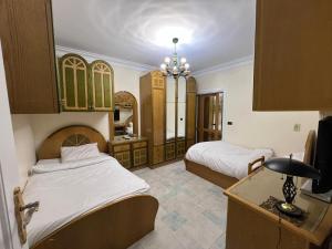 Ένα ή περισσότερα κρεβάτια σε δωμάτιο στο 3 Bedroom apartment with Garden & Office +9 φωτογραφίες