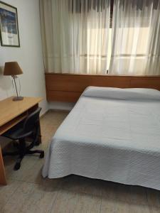 Postel nebo postele na pokoji v ubytování Hostal Jose Luis
