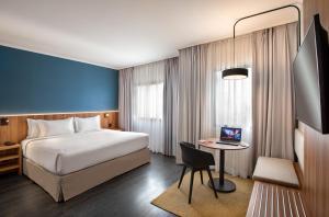 Cama ou camas em um quarto em INNSiDE by Meliá São Paulo ITAIM
