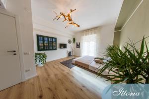 Postel nebo postele na pokoji v ubytování DOMUS DEIANAS two comfortable apartments in Cagliari