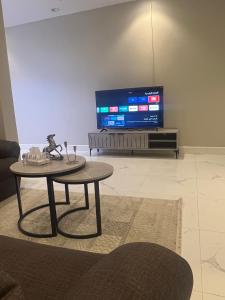 TV a/nebo společenská místnost v ubytování شقة بغرفة وصالة