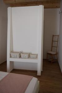 Postel nebo postele na pokoji v ubytování La casa di Mauro