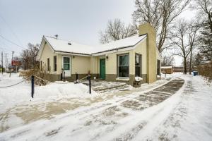 a house is covered in snow with a driveway at 4 Mi to Dtwn Kalamazoo Central Apt in Kalamazoo