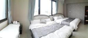 Postel nebo postele na pokoji v ubytování Slow Fly B&B