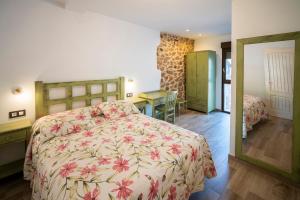 Postel nebo postele na pokoji v ubytování Casa tio Basilio