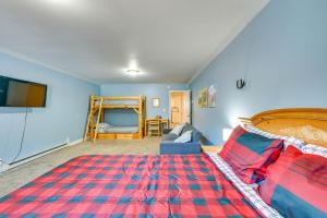 a bedroom with a bed and a couch at Private Hot Tub and Mtn Views Garden Valley Apt! in Crouch