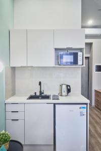 Kuchyňa alebo kuchynka v ubytovaní NAVI Residence Erzsebet
