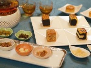 a table topped with white plates with different types of food at YAMANO RESORT HOTEL EIGHE - Vacation STAY 20058v in Shiozawa