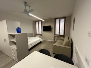 A bed or beds in a room at Residenza della Samaritana Classici