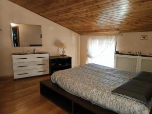 Postel nebo postele na pokoji v ubytování Ta maison e Ta maison oro