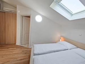 Postel nebo postele na pokoji v ubytování House Skrabic