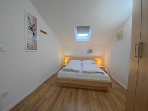 Postel nebo postele na pokoji v ubytování House Skrabic