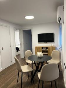 Μια τηλεόραση ή/και κέντρο ψυχαγωγίας στο Apartamento Manzana