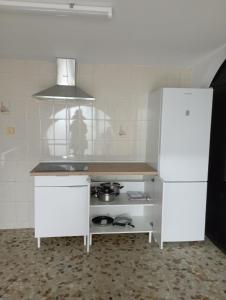 Η κουζίνα ή μικρή κουζίνα στο Habitaciones con baño propio y zonas compartidas