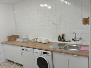 Η κουζίνα ή μικρή κουζίνα στο Habitaciones con baño propio y zonas compartidas