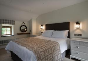 En eller flere senge i et værelse på Tyddyn at Hendre Rhys Gethin