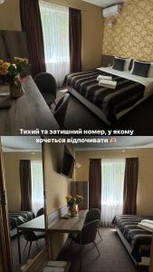 Postel nebo postele na pokoji v ubytování Шляпа