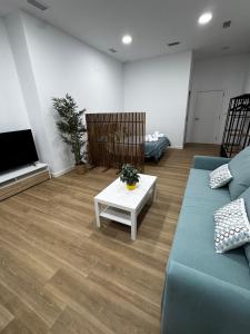 Et tv og/eller underholdning på Apartamento playa malvarrosa + 3 billeder